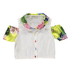 White and green blouse with colorful buttons and floral pattern