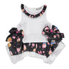 White and black top with ruffles in a cupcake pattern